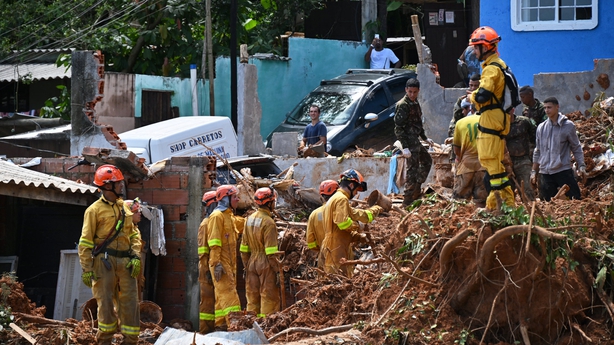 Rescue workers continue to search for survivors as dozens remain missing
