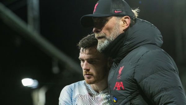 Jurgen Klopp (R) with Liverpool defender Andy Robertson after drawing with Palace