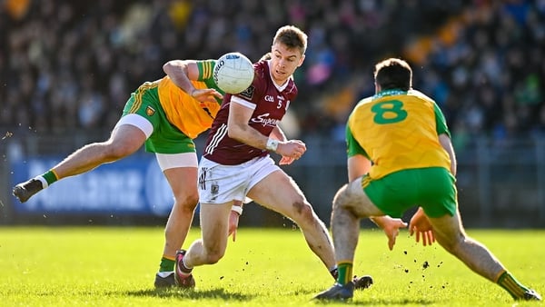 Dylan McHugh of Galway in action against Donegal's Daire Ó Baoill and Caolan McGonagle