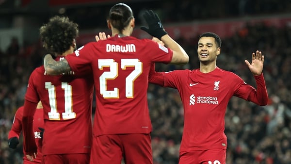 Mohamed Salah of Liverpool celebrates with teammates Darwin Nunez and Cody Gakpo