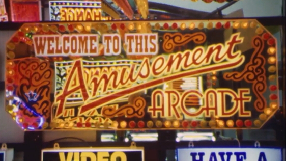 Electronic gaming machines in an amusement arcade, 1983.