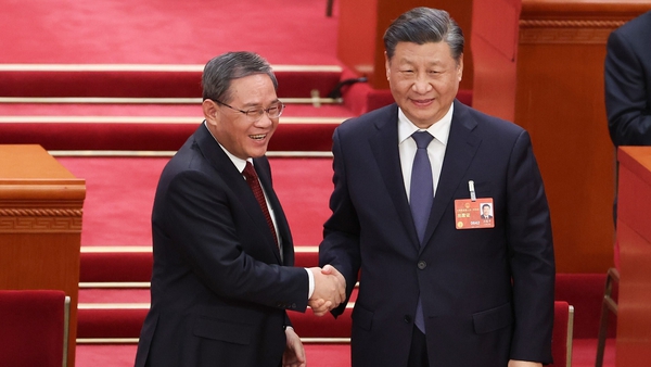 Li Qiang (L) is one of Chinese President Xi Jinping's most trusted allies