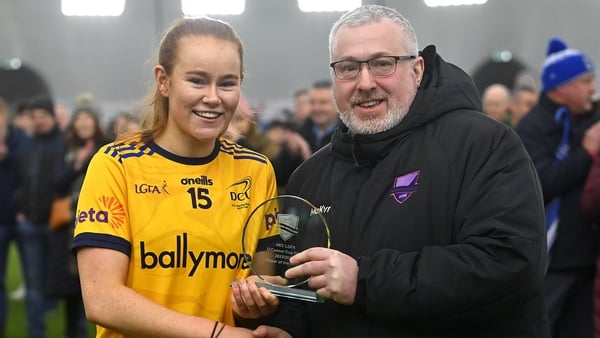 Kate Kenny of DCU Dóchas Éireann is presented with the Player of the Match award
