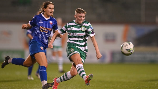 Jaime Thompson (R) fires home her hat-trick goal at Tallaght Stadium