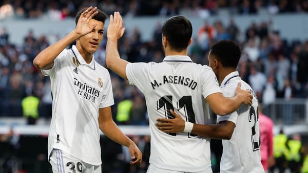 Marco Asensio is congratulated after scoring Real Madrid's third goal