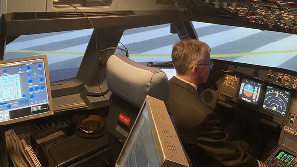 Former heart surgeon and now Captain Niall Downey in a flight simulator