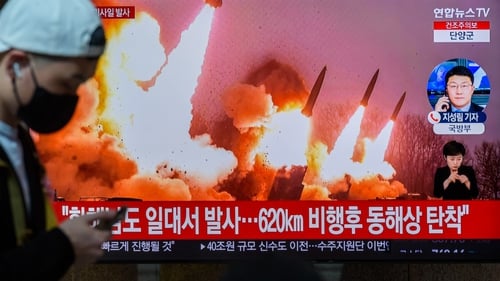 A TV screen shows North Korea's KCNA released picture of North Korea's missile launch on Monday
