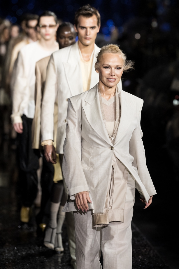 Actress Pamela Anderson walks the runway during the Boss Spring/Summer 2023