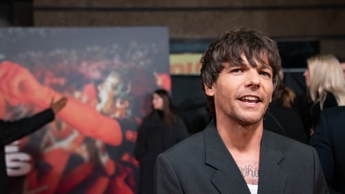 Louis Tomlinson arrives at the All Of Those Voices UK Premiere at Cineworld Leicester Square on 16 March in London, England. (Photo by Joseph Okpako/WireImage)