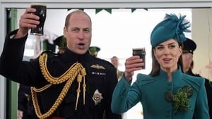 Britain's Prince William and, Catherine Princess of Wales enjoy a Guinness with members of the 1st Battalion Irish Guards in Aldershot
