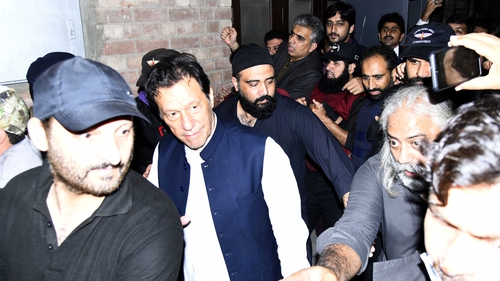 Imran Khan arrives to appear before Lahore High Court in Pakistan yesterday