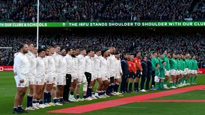 The teams line up for the anthems
