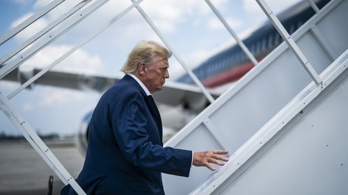 Former US President Donald Trump boards his plane in Florida last Monday