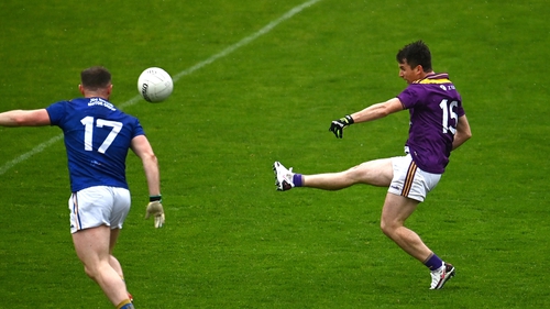Ben Brosnan (R) earned Wexford a point against Wicklow