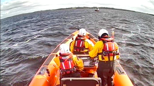 RNLI volunteers were told all on board were safe, unharmed and wearing their lifejackets, once they landed on the yacht (Photo: RNLI)