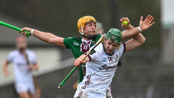 Brian Concannon of Galway in action against Davy Glennon of Westmeath