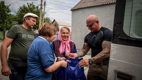 Dathan Brennan with locals in Ukraine