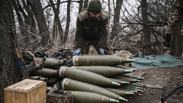 A Ukrainian serviceman prepares 155mm artillery shells near Bakhmut