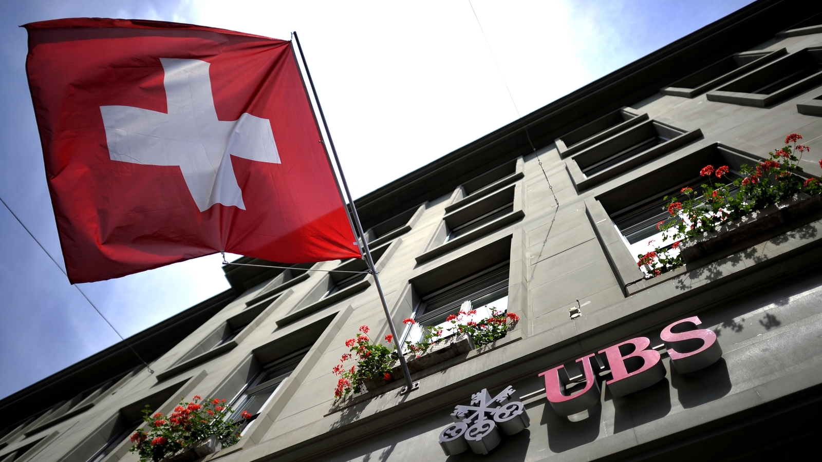 UBS faces investors after Credit Suisse takeover deal