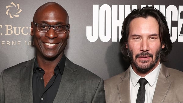 Lance Reddick and Keanu Reeves, pictured at the premiere of John Wick: Chapter Two in Hollywood in January 2017
