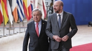 UN Secretary-General Antonio Guterres (L) and President of the European Council Charles Michel (R) arrive at the EU summit