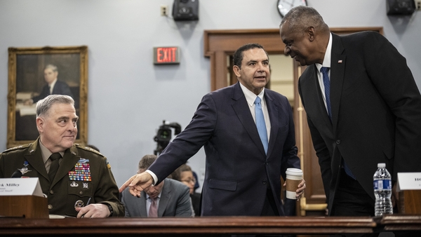 US Secretary of Defense Lloyd Austin (R) - who confirmed the strikes - speaks with US general Mark Milley (L) at the Capitol building yesterday