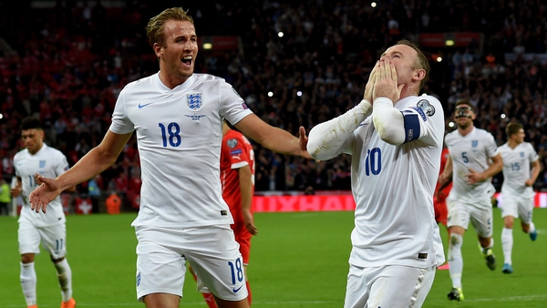 Harry Kane (L) celebrating with Wayne Rooney when the latter set the England scoring record in 2015