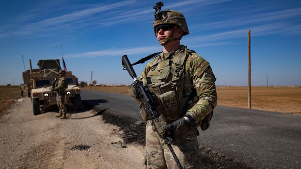 US troops patrol iSyria's Hasakeh province last month