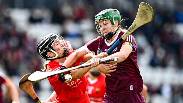 Sabina Rabbitte of Galway battles past Cork's Laura Tracey