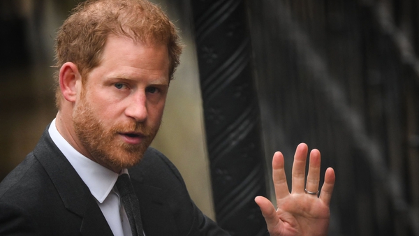 Britain's Prince Harry, Duke of Sussex waves as he arrives at the Royal Courts of Justice, Britain's High Court, in central London