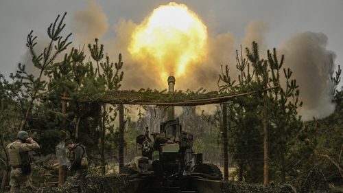 Ukrainian servicemen fire with a TRF-1 155mm at Russian positions