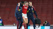 Katie McCabe being helped off the pitch in Arsenal's 2-0 Champions League win over Bayern Munich