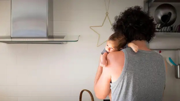 newborn and parent