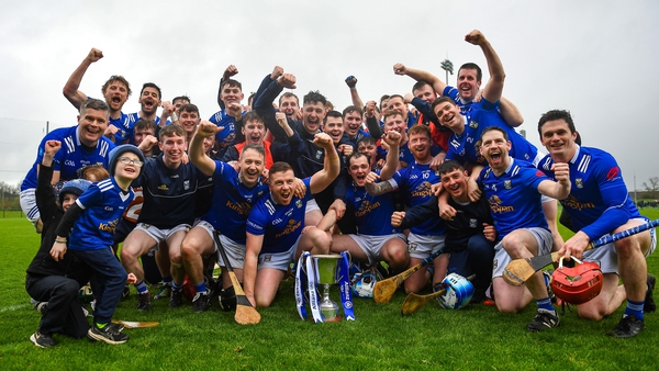 Cavan players celebrate with the Division 3B trophy