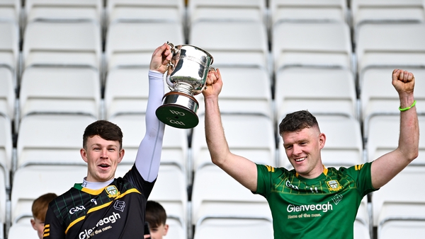Meath joint captains Charlie Ennis and Jack Regan lift the cup