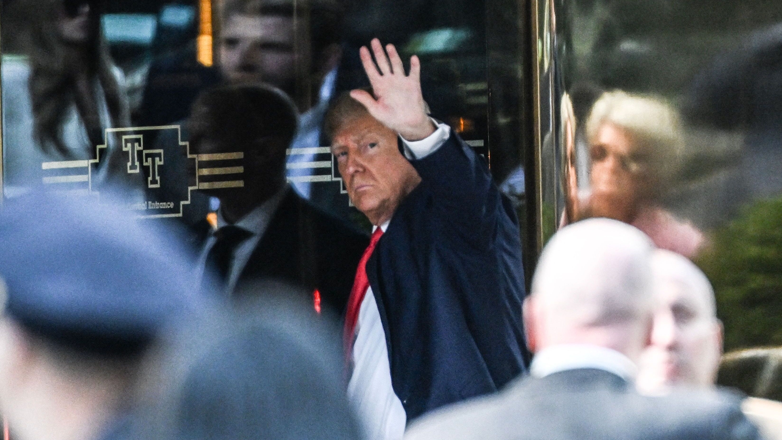 Trump arrives in New York to face criminal charges