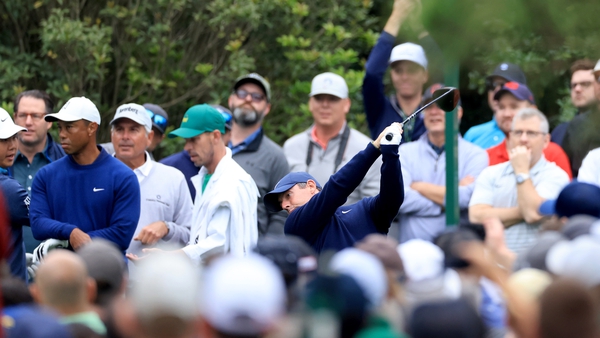 Rory McIlroy tees off during a practice round with Tiger Woods at Augusta