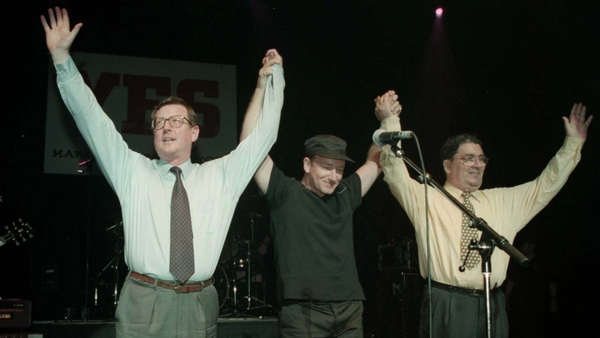 Ulster Unionist leader David Trimble (left), U2 singer Bono, and SDLP leader John Hume on stage for the 'YES' concert at the Waterfront Hall in Belfast on 19 May