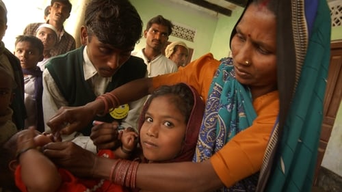 A child receives a polio vaccine at a clinic set up by the World Health Organization in India in 2003