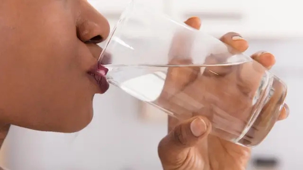 Drinking a glass of water