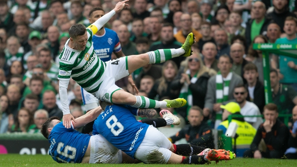 Rangers' Ryan Jack and John Souttar tackle Celtic's Callum McGregor