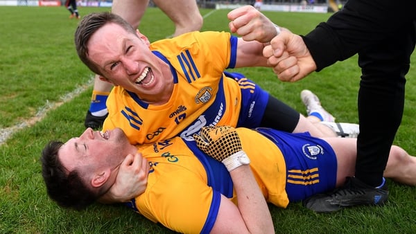 Eoin Cleary and Keelan Sexton celebrate after Clare's one-point win in Ennis