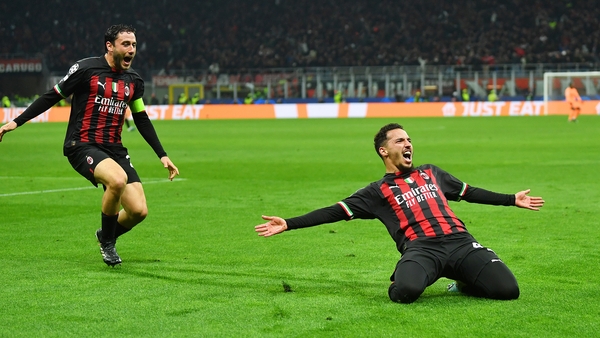 AC Milan captain Davide Calabria rushes to celebrate with goalscorer Ismael Bennacer