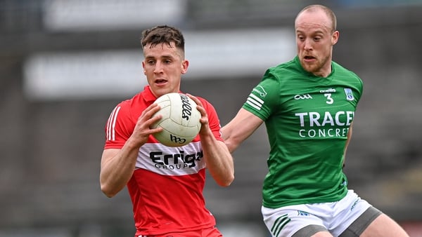 Derry's Shane McGuigan and Ché Cullen of Fermanagh - the pair would get two goals apiece at Brewster Park.