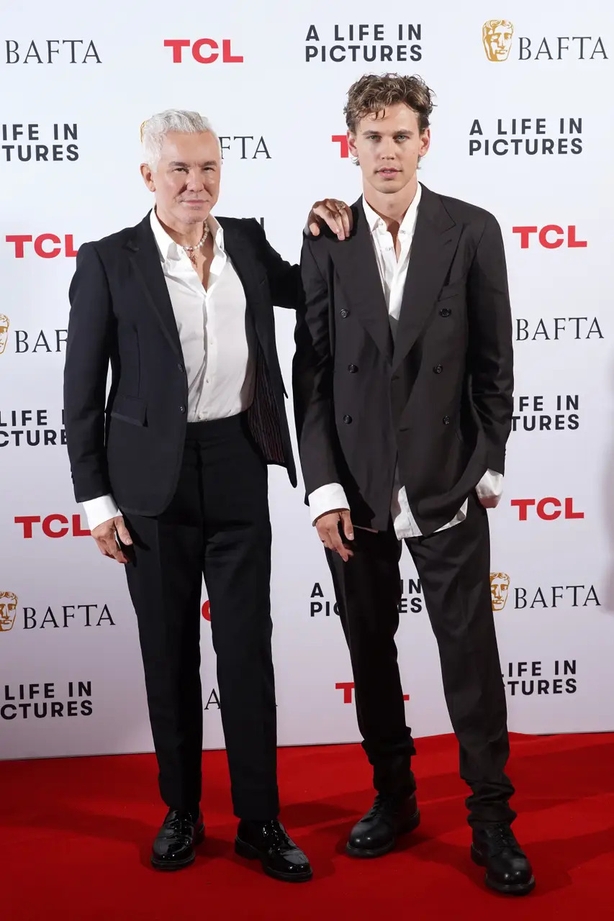 Luhrmann, left, with Elvis star Austin Butler (PA)