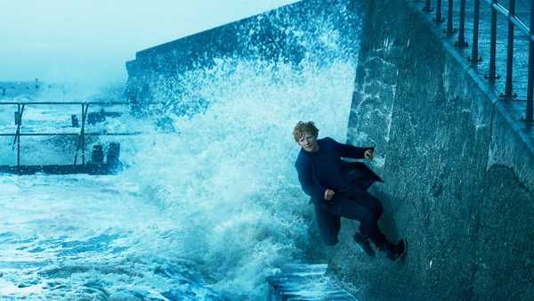 Ed braves the waves. Photo credit: Annie Leibovitz