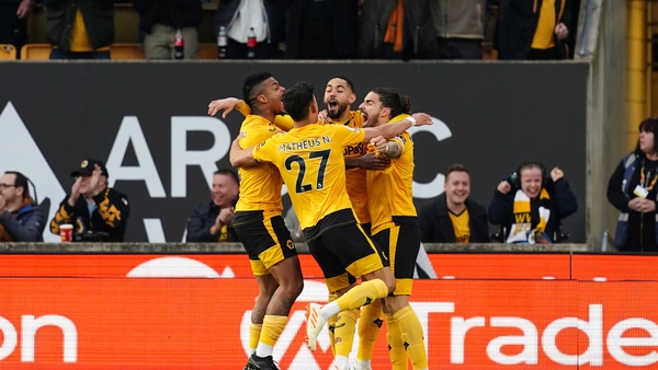 Wolves players celebrate after Joachim Andersen's own goal