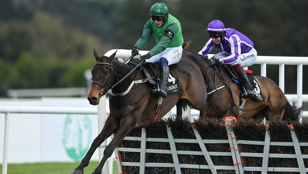 Impaire Et Passe (L)with Paul Townend up, jumps the last ahead of High Definition
