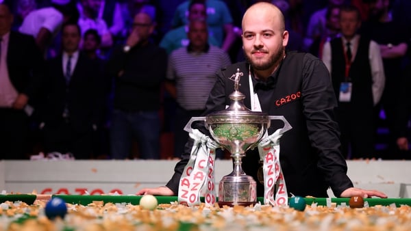 Luca Brecel defeated Mark Selby 18–15 in last year's final