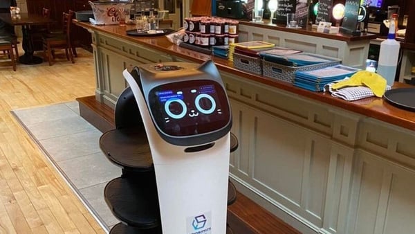 A grand soft day, lads - now what can I get you? Bella the robot at work at Nevin's Newfield Inn, Newport, Co Mayo